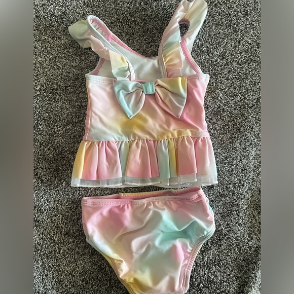 4 infant swim suits, 2 Minnie Mouse, 1 lion king and 1 multi colored - Picture 9 of 10